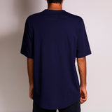 Rear view of skate Crew Shirt Navy, worn by a skateboarder in India.